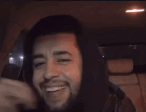 A Man In A Hooded Jacket With The Words Block Haha On The Bottom GIF