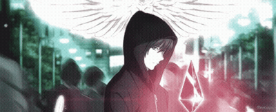 A Man In A Hooded Jacket With Wings Holds A Crystal GIF