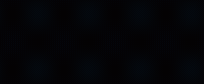 A Man In A Hooded Robe Looks At The Camera In A Dark Room GIF