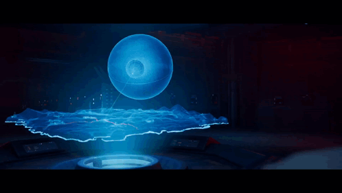 A Man In A Hooded Robe With A Green Light Coming Out Of His Mouth GIF
