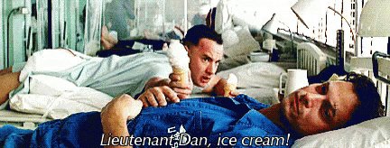 A Man In A Hospital Bed Is Holding An Ice Cream Cone And Says Lieutenant Dan Ice Cream .. GIF