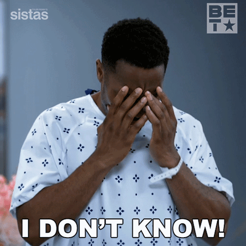 A Man In A Hospital Gown Covering His Face With His Hands And The Words " I Don 'T Know " Below Him GIF