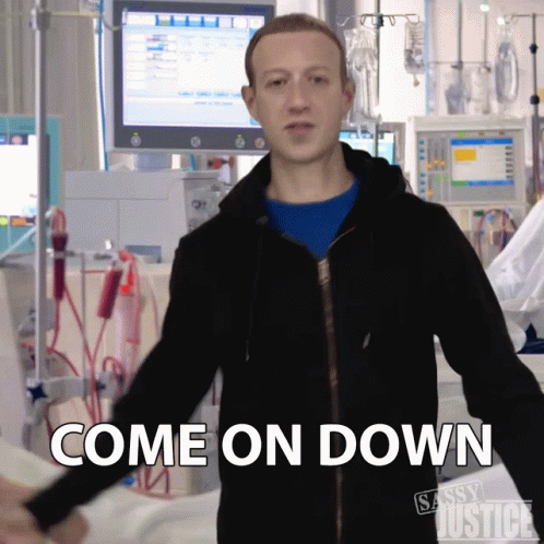 A Man In A Hospital Room With The Words Come On Down Behind Him GIF