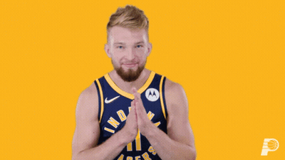 A Man In A Indiana Pacers Jersey Applauds GIF