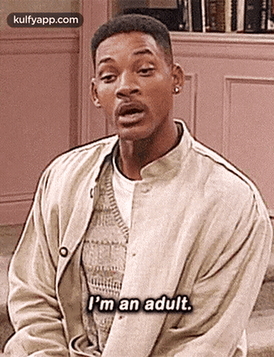 A Man In A Jacket Is Sitting Down And Saying `` I 'M An Adult . '' GIF