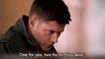 A Man In A Jacket Is Talking To Another Man And Says One For Yes , Two For No . You Alive ? GIF