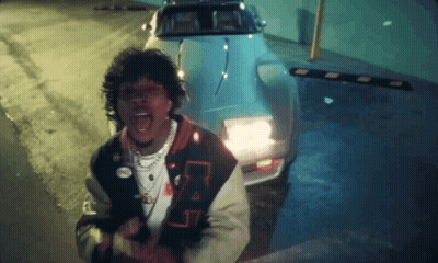 A Man In A Jacket With The Letter A On It GIF