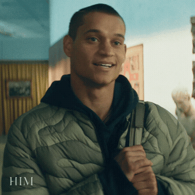 A Man In A Jacket With The Word Him On The Bottom GIF