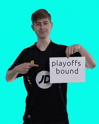 A Man In A Jd Shirt Holds Up A Sign That Says Playoffs Bound GIF