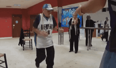 A Man In A Jersey With The Number 6 On It Is Dancing In A Dance Studio GIF