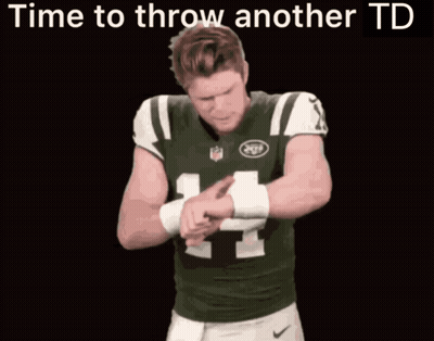 A Man In A Jets Jersey Is Pointing At The Camera With The Words Time To Throw Another Td Above Him GIF