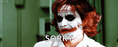A Man In A Joker Costume Says Sorry GIF
