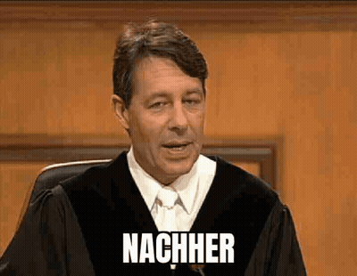 A Man In A Judge 'S Robe Is Giving A Speech And The Word Nachher Is On The Screen Behind Him GIF
