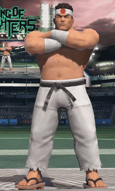 A Man In A Karate Outfit Stands With His Arms Crossed In Front Of A Sign That Says King Of Fighters GIF