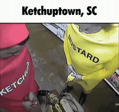 A Man In A Ketchup Costume And A Man In A Yellow Mustard Costume GIF