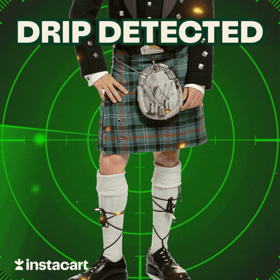 A Man In A Kilt Is Standing In Front Of A Green Target That Says Instacart GIF