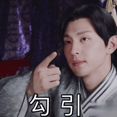 A Man In A Kimono Is Pointing At Something With Chinese Writing On His Face GIF