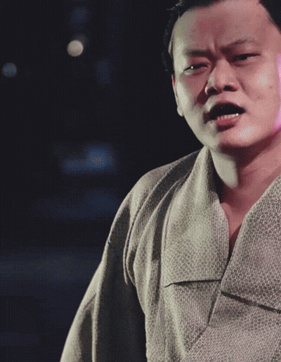 A Man In A Kimono Making A Funny Face GIF