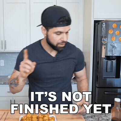 A Man In A Kitchen With The Words " It 'S Not Finished Yet " GIF