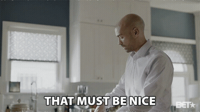 A Man In A Kitchen With The Words That Must Be Nice Below Him GIF