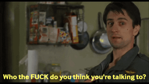 A Man In A Kitchen With The Words " Who The Fuck Do You Think You 'Re Talking To " Below Him GIF