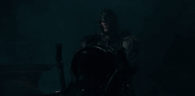A Man In A Knight 'S Armor Is Riding A Horse In The Dark . GIF