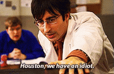 A Man In A Lab Coat And Glasses Says Houston We Have An Idiot GIF