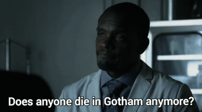 A Man In A Lab Coat And Tie Is Asking If Anyone Die In Gotham Anymore GIF