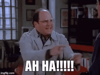 A Man In A Lab Coat Is Pointing At Someone And Saying Ah Ha !!! GIF
