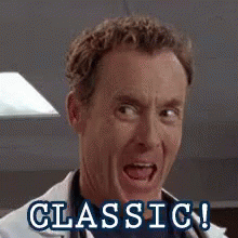 A Man In A Lab Coat Is Smiling And The Words Classic Are Visible Behind Him . GIF