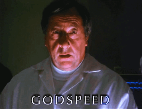 A Man In A Lab Coat With The Word Godspeed On The Bottom GIF