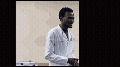 A Man In A Lab Coat With The Word Hawu Written Above Him GIF