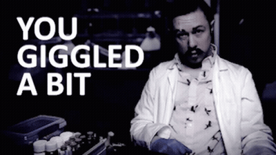 A Man In A Lab Coat With The Words You Giggled A Bit Above Him GIF