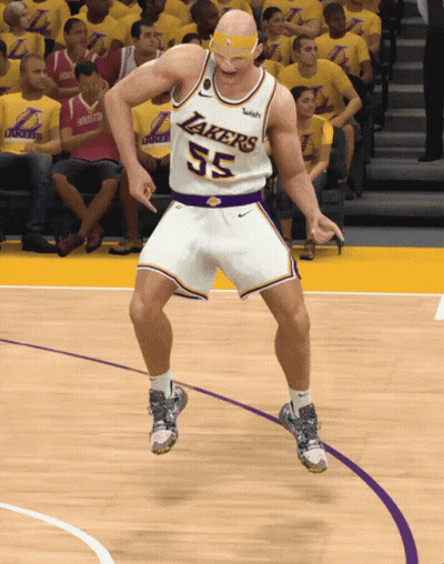 A Man In A Lakers Jersey Is Dancing On A Basketball Court GIF
