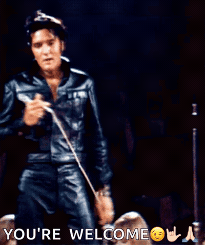 A Man In A Leather Jacket Is Holding A Microphone And The Words You 'Re Welcome Are Above Him GIF