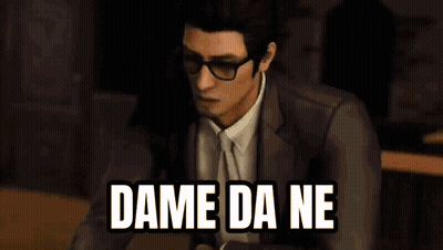 A Man In A Leather Jacket Is Sitting At A Table With The Words `` Dame Da Ne '' Written On The Screen . GIF