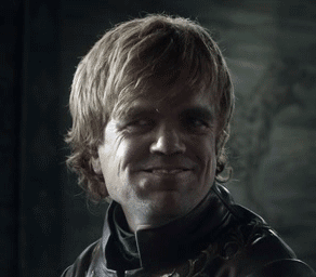 A Man In A Leather Jacket Is Smiling In A Black And White Photo GIF