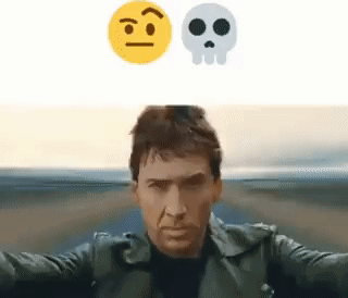 A Man In A Leather Jacket Is Taking A Selfie With A Skull And A Smiley Face Above His Head . GIF