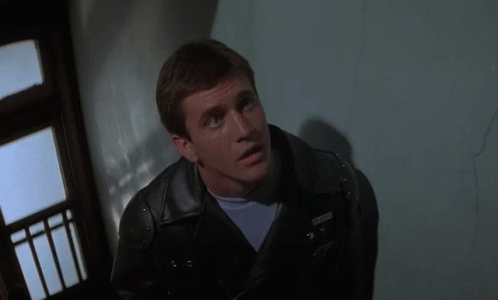 A Man In A Leather Jacket Says " Any Longer Out On That Road And I 'M One Of Them " GIF