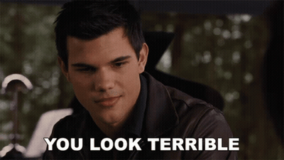 A Man In A Leather Jacket With The Words You Look Terrible Below Him GIF