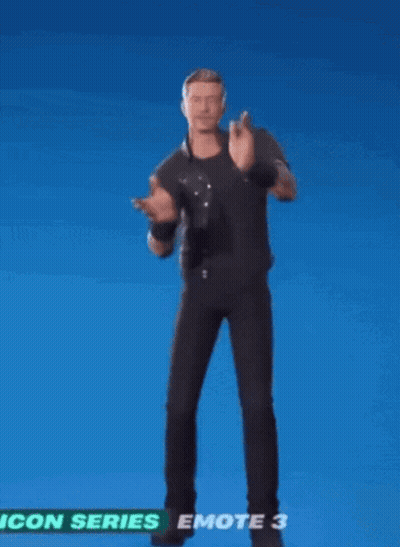 a man in a leather vest is jumping in the air with his arms in the air .