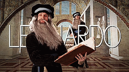 A Man In A Leonardo Costume Holds A Large Book GIF