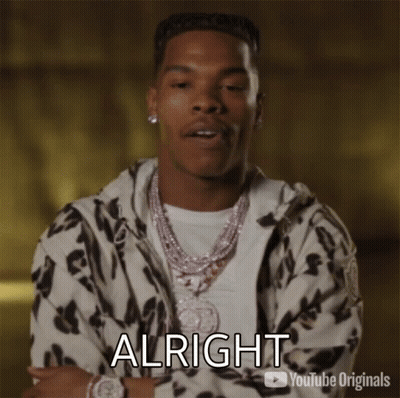 A Man In A Leopard Print Jacket Is Making A Funny Face And Says Alright GIF
