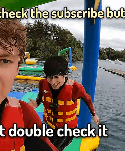 A Man In A Life Jacket Is Smiling In Front Of A Sign That Says Check The Subscribe But I Double Check It GIF