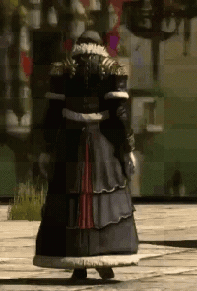 A Man In A Long Black Coat Is Standing In Front Of A Building . GIF