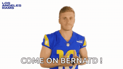 A Man In A Los Angeles Rams Jersey Says Come On Bernard ! GIF