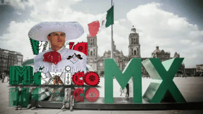 A Man In A Mariachi Outfit Stands In Front Of A Sign That Says Mexico GIF