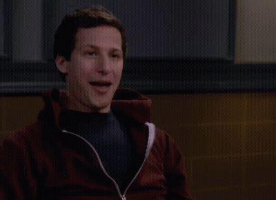 A Man In A Maroon Jacket Is Giving A Thumbs Down GIF