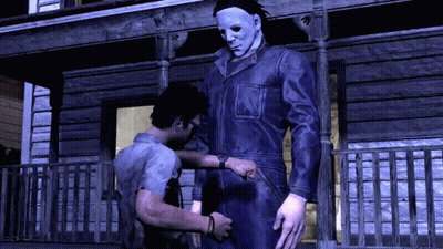 A Man In A Mask Is Standing Next To A Man In A Jumpsuit GIF