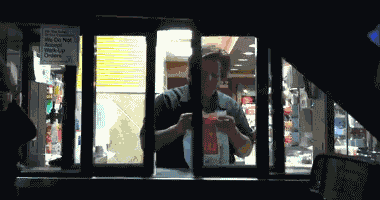 A Man In A Mcdonalds Drive Thru Window GIF